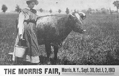 Flyer for the fair.  A girl with a cow
